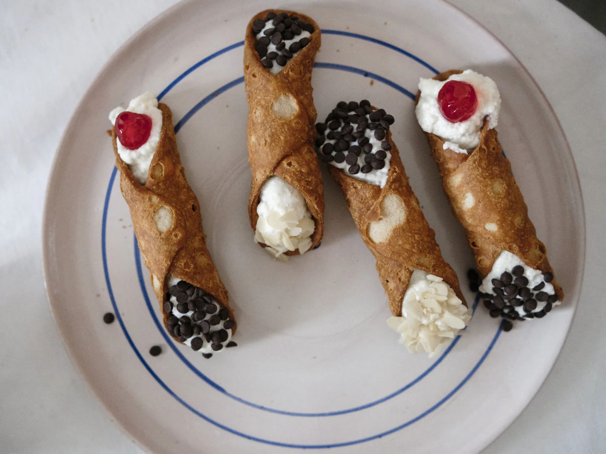 Viaggio nei sapori di Palermo: mercato di Ballarò e cucina autentica